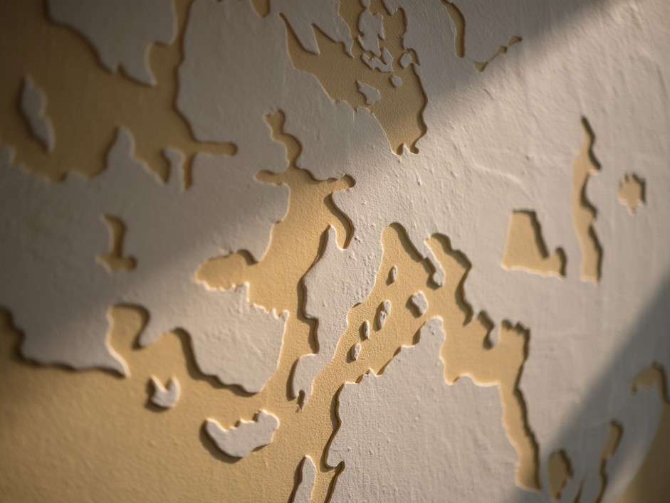 Фактурная декоративная штукатурка Карта мира вблизи